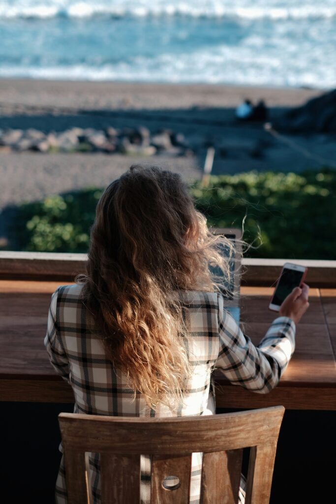 Digital nomad working with a sea view